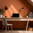 contemporary home office interior design with warm orange paint on interior walls