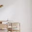 cozy modern dining room interior with a cream painted wall signifying elegance and property value